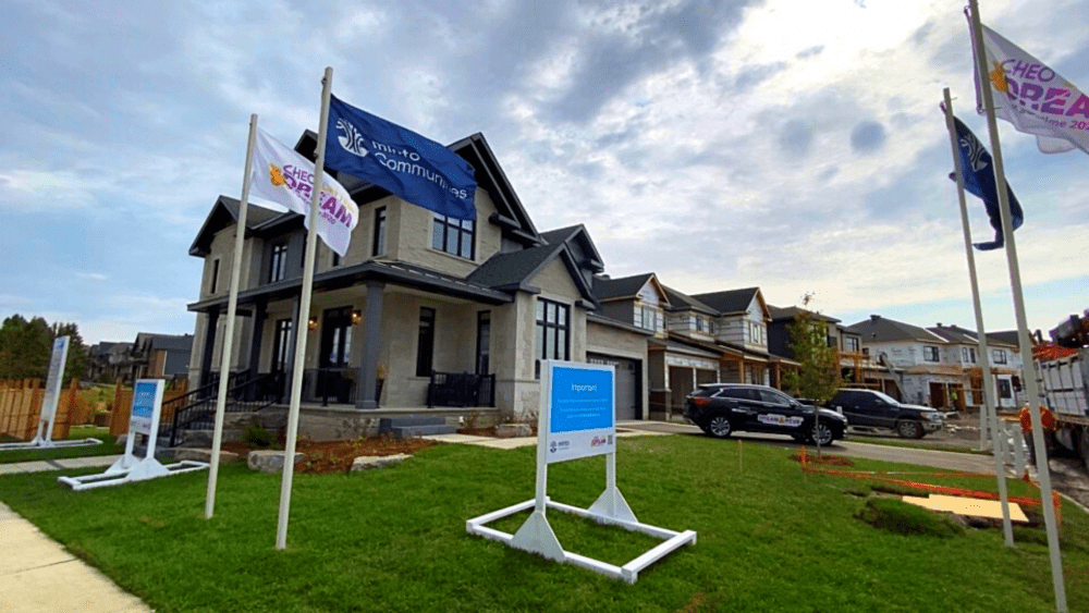 cheo dream of a lifetime home with flags out front